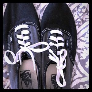 Used gray and black Vans sneakers